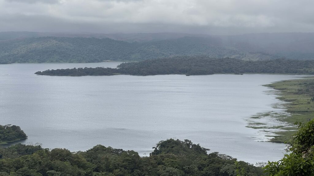 lake arenal viewed from above at sky adventures with clouds all around