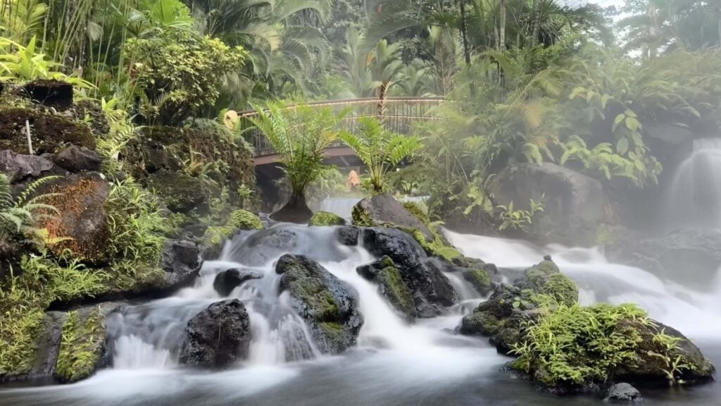 long exposure phot oof the cascading water at tabacon thermal hot springs resort
