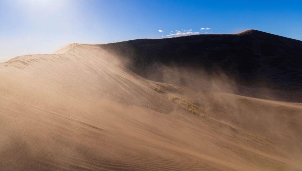 windy day on the dunes in great sand dunes national park in colorado